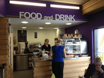 Inside Enterprise building cafe with ‘Food and Drink’ sign.
